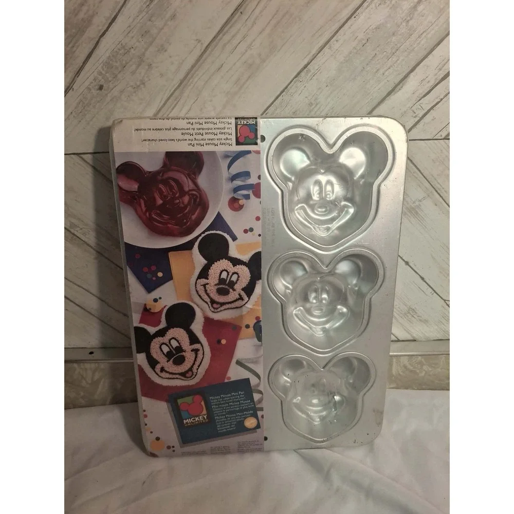 Mickey Mouse Mini Pan For Cakes. New . In Factory Seal. 6 shapes on pan.